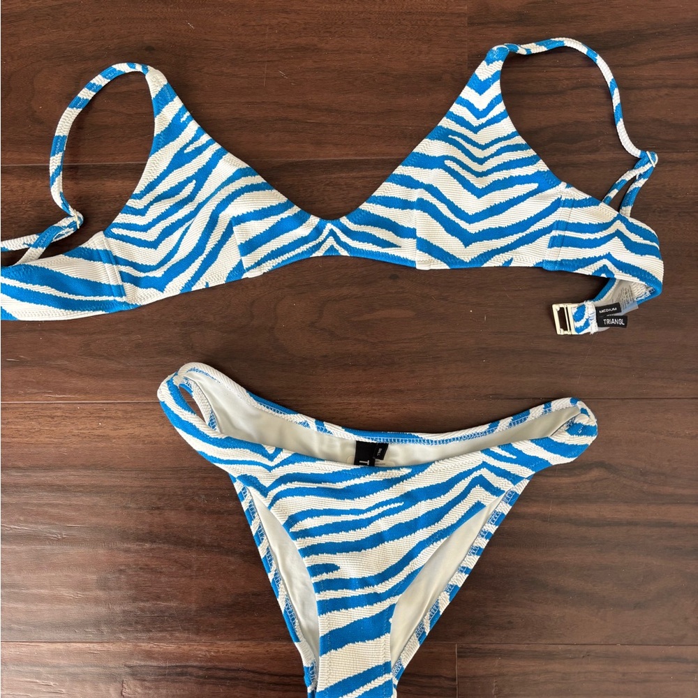 TRAINGL swimsuit! too- medium (runs a little small) bottoms- small